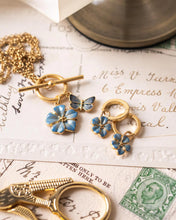 Load image into Gallery viewer, Enamel Forget-Me-Not Huggie Hoop Earrings