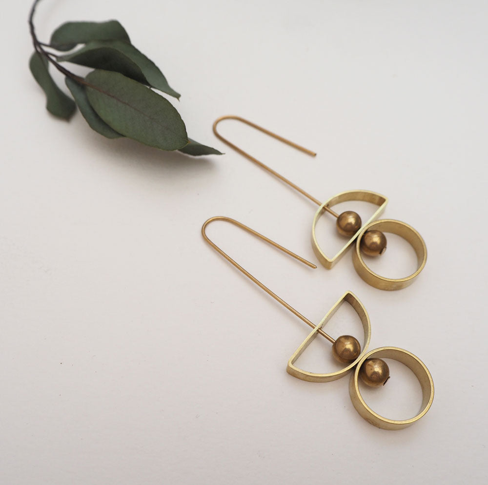 Consta - balancing rings brass earrings
