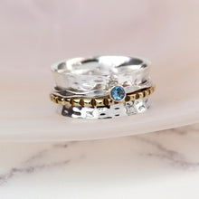 Load image into Gallery viewer, Sterling silver spinning ring with Blue Topaz gemstone