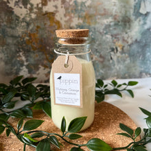 Load image into Gallery viewer, Nutmeg, Orange &amp; Cinnamon - Pippin 200ml milk bottle candle with cork lid
