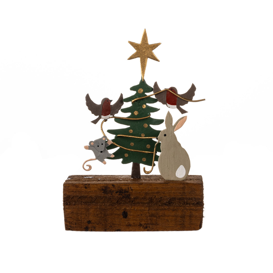 Animals decorating the Christmas tree - tabletop decoration