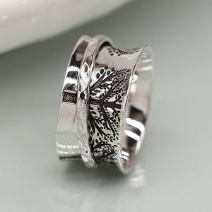 Sterling silver tree spinning ring with narrow hammered band