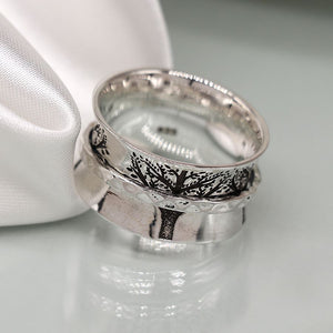 Sterling silver tree spinning ring with narrow hammered band