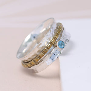 Sterling silver spinning ring with Blue Topaz gemstone