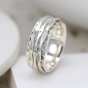Sterling silver ring with three spinning silver bands