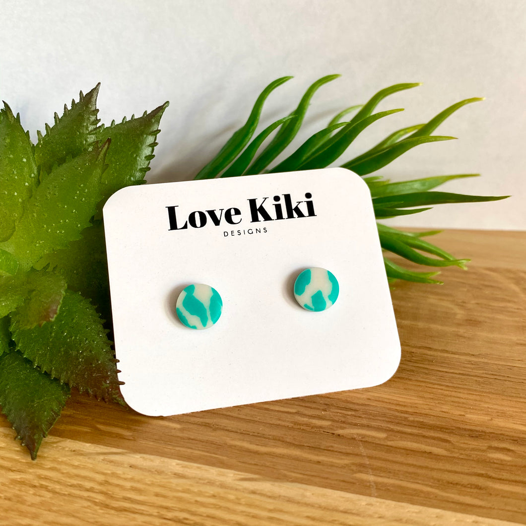 Small round green and white clay stud earrings