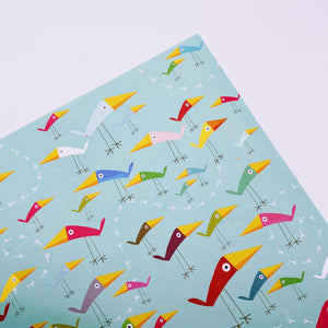 Birds on blue wrapping paper