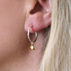 Silver hoop and gold star earrings