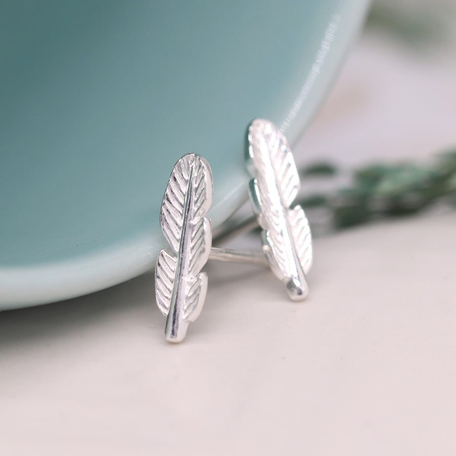 Silver tiny feather studs