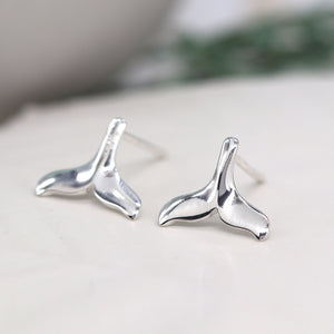 Silver tail fin studs