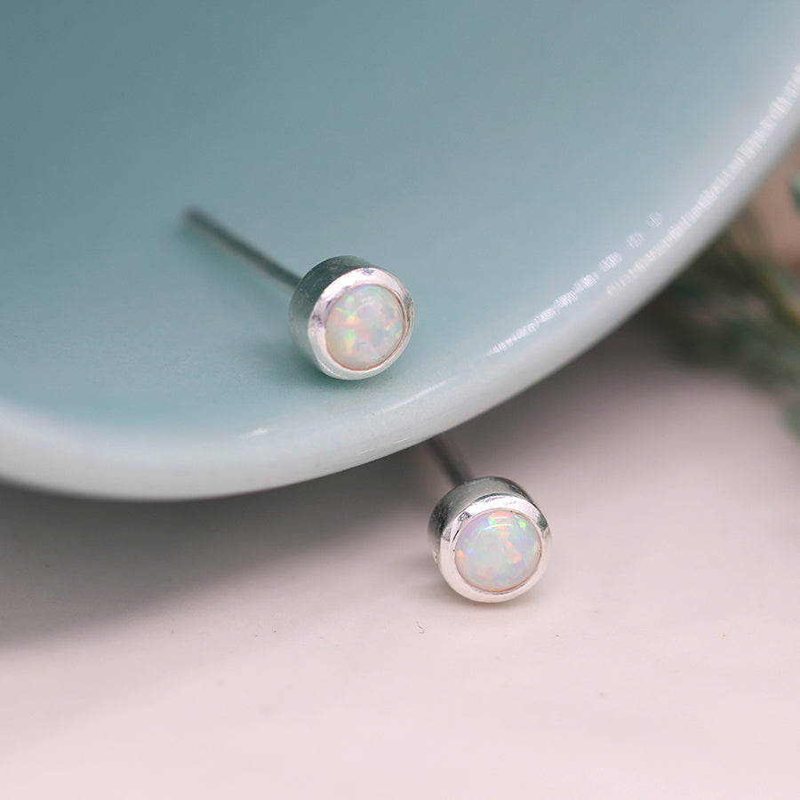 Tiny silver round opal studs