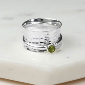 Sterling silver spinning ring with peridot