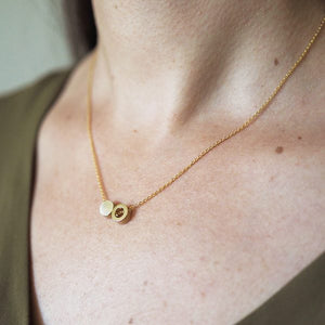 Brass ring and disc necklace