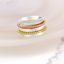 Load image into Gallery viewer, Sterling silver spinning ring with mixed metal twists
