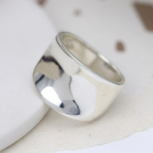 Sterling silver ring with a smooth concave band