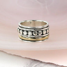 Load image into Gallery viewer, Sterling silver and brass spinning ring with dots
