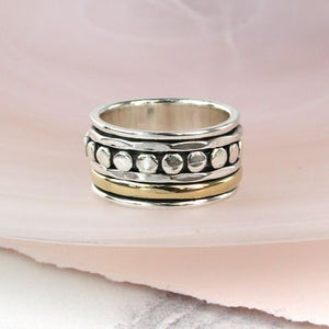Sterling silver and brass spinning ring with dots