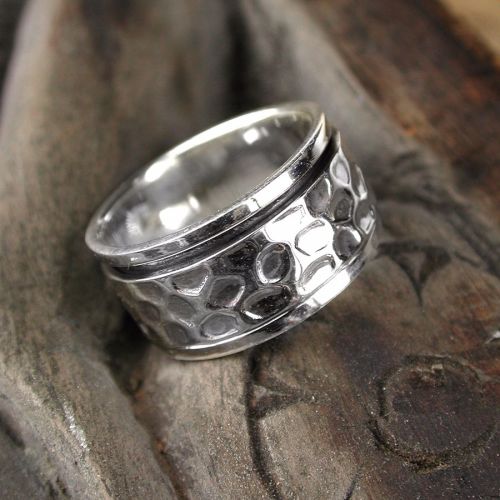 Sterling silver spinning ring with wide hammered band