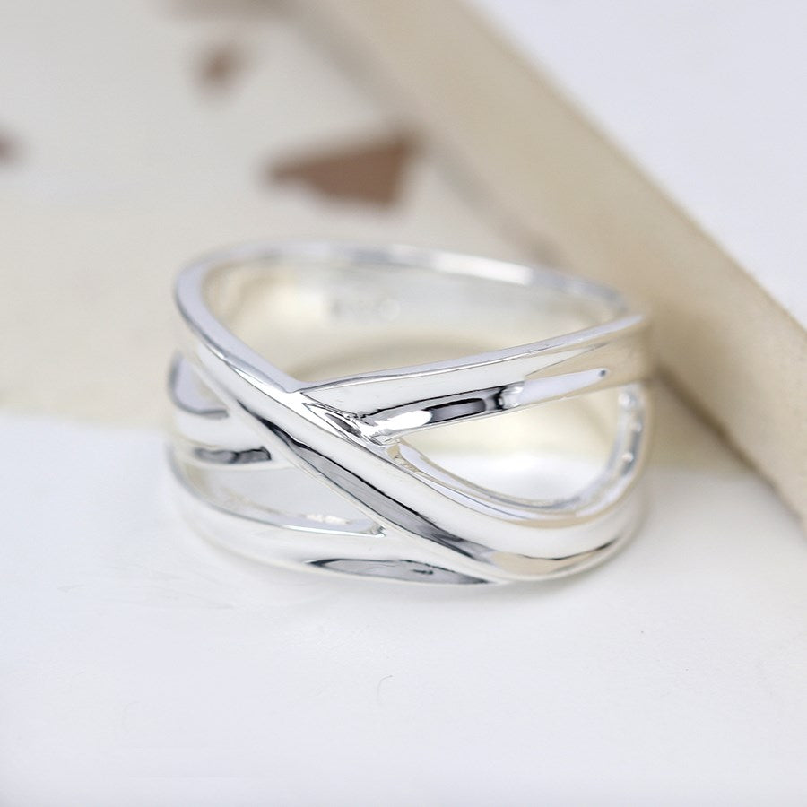 Sterling silver ring with multi strand crossover design