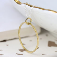 Load image into Gallery viewer, Gold hammered circle pendant on silver chain
