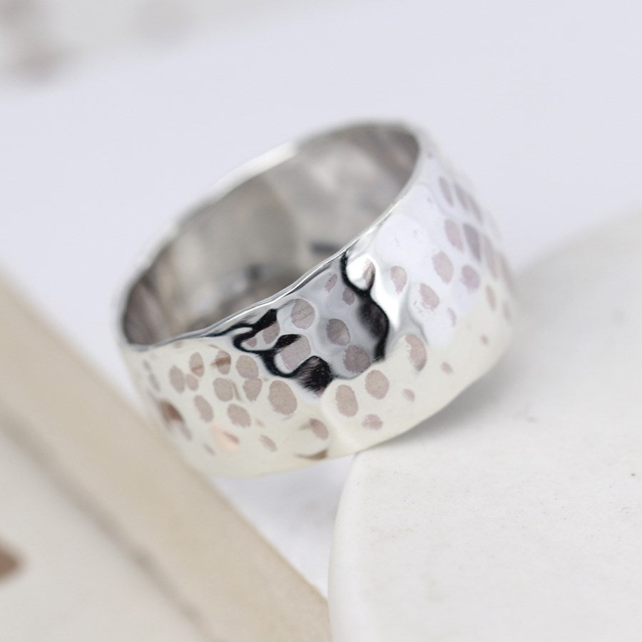 Sterling silver wide band ring with a hammered finish